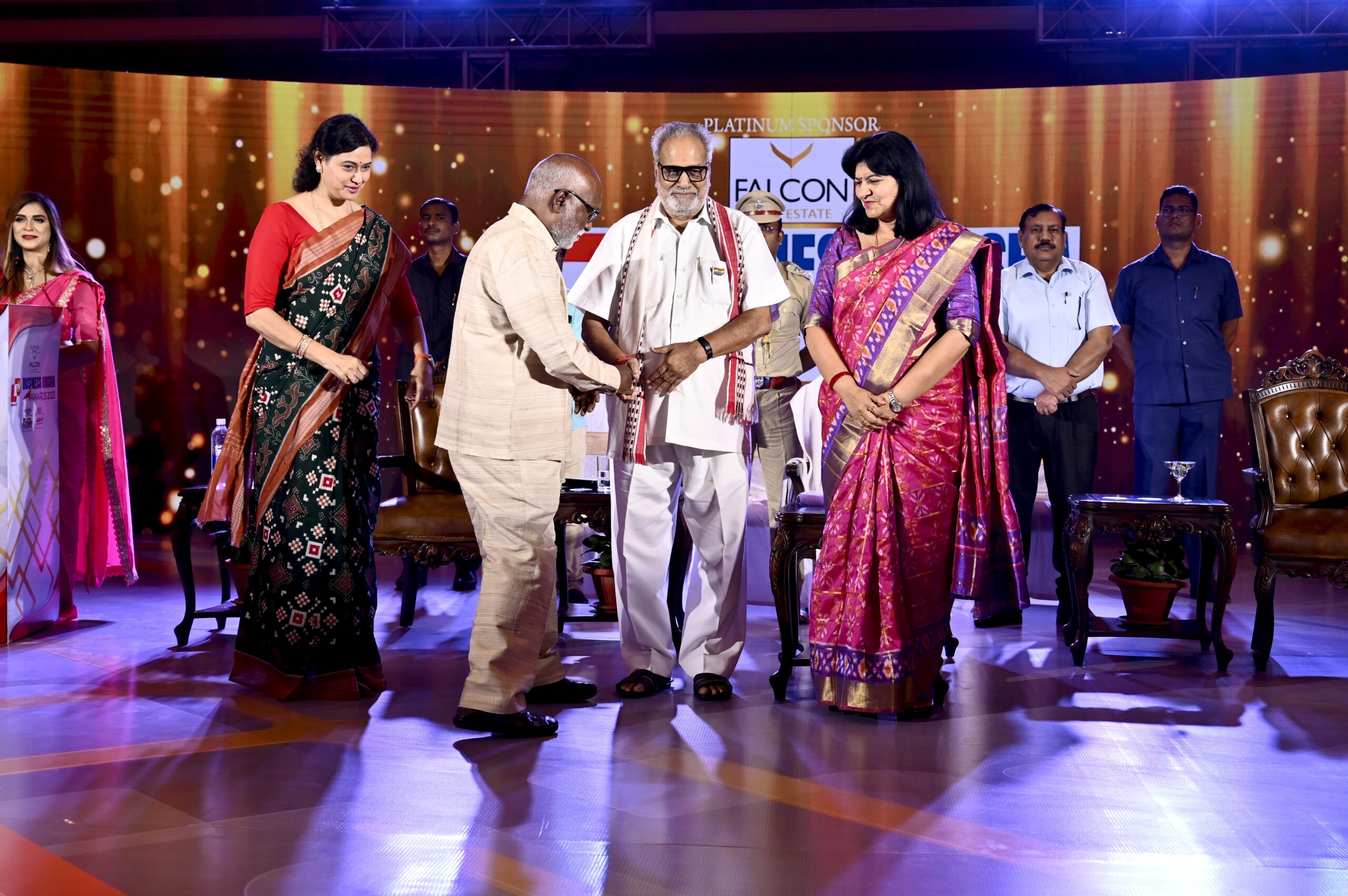 Kasturi Food Products award presentation — team members celebrating at industry recognition event