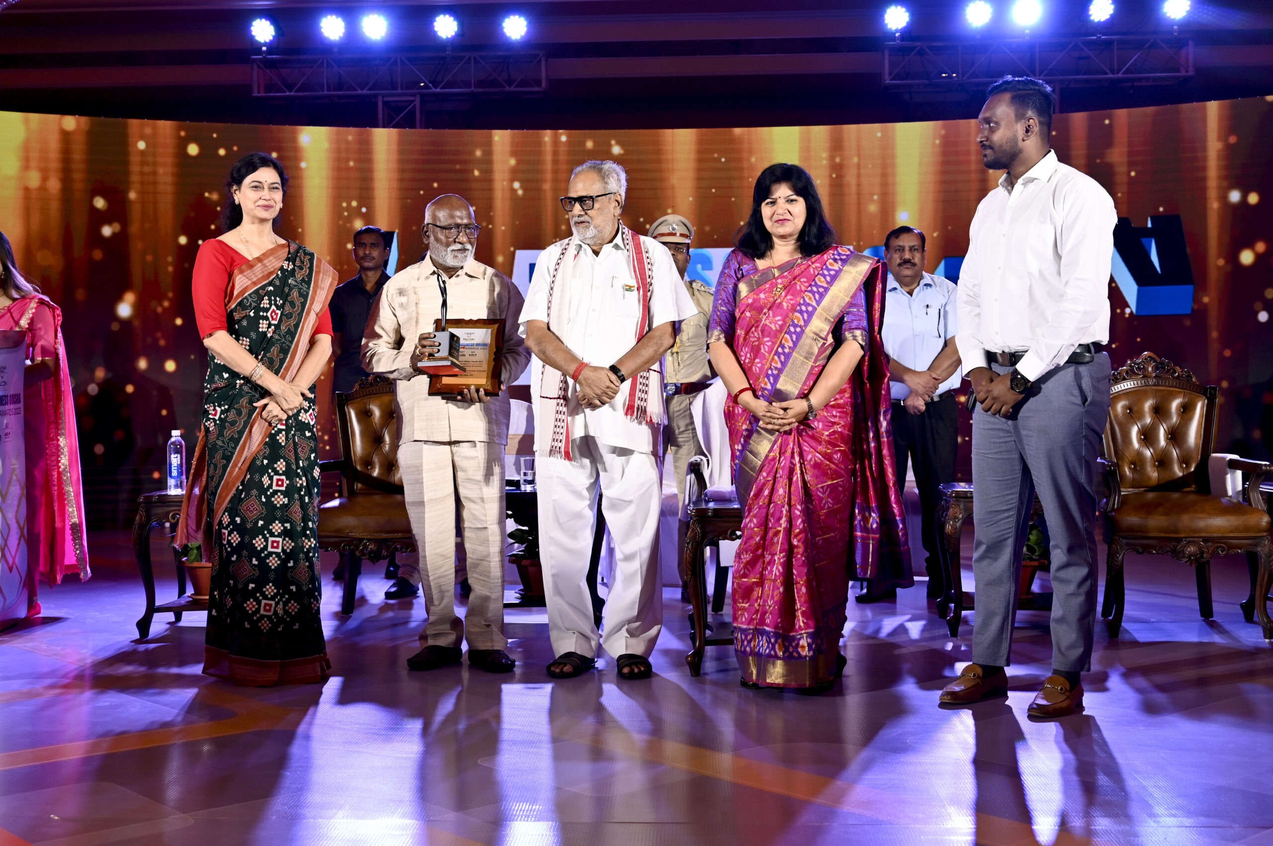 Kasturi Food Products award ceremony — team receiving recognition for food manufacturing excellence